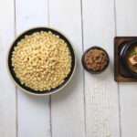 Conserva di fagioli in scatola con etichetta evidenziata, simbolo di allerta per salute e ingredienti.